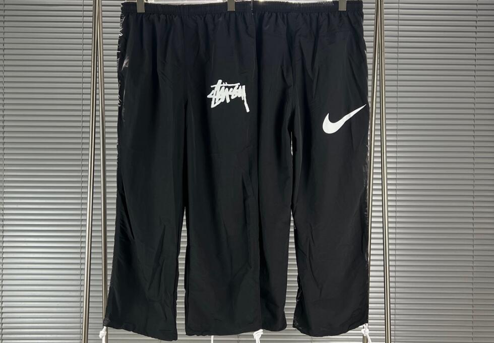 stussy イージーパンツスーパーコピー ズボン 防水 防風 Nike x Stussyコラボ ランニング シンプル ブラック